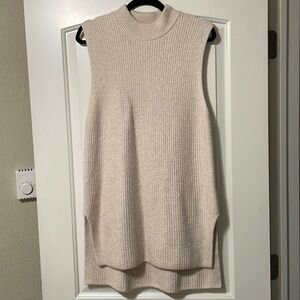 Soft cream turtleneck sleeveless sweater